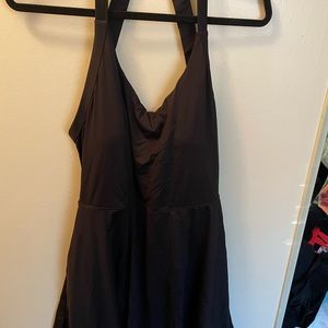 Backless Halara cut out twisted side pocket dress with built-in shorts and bra.